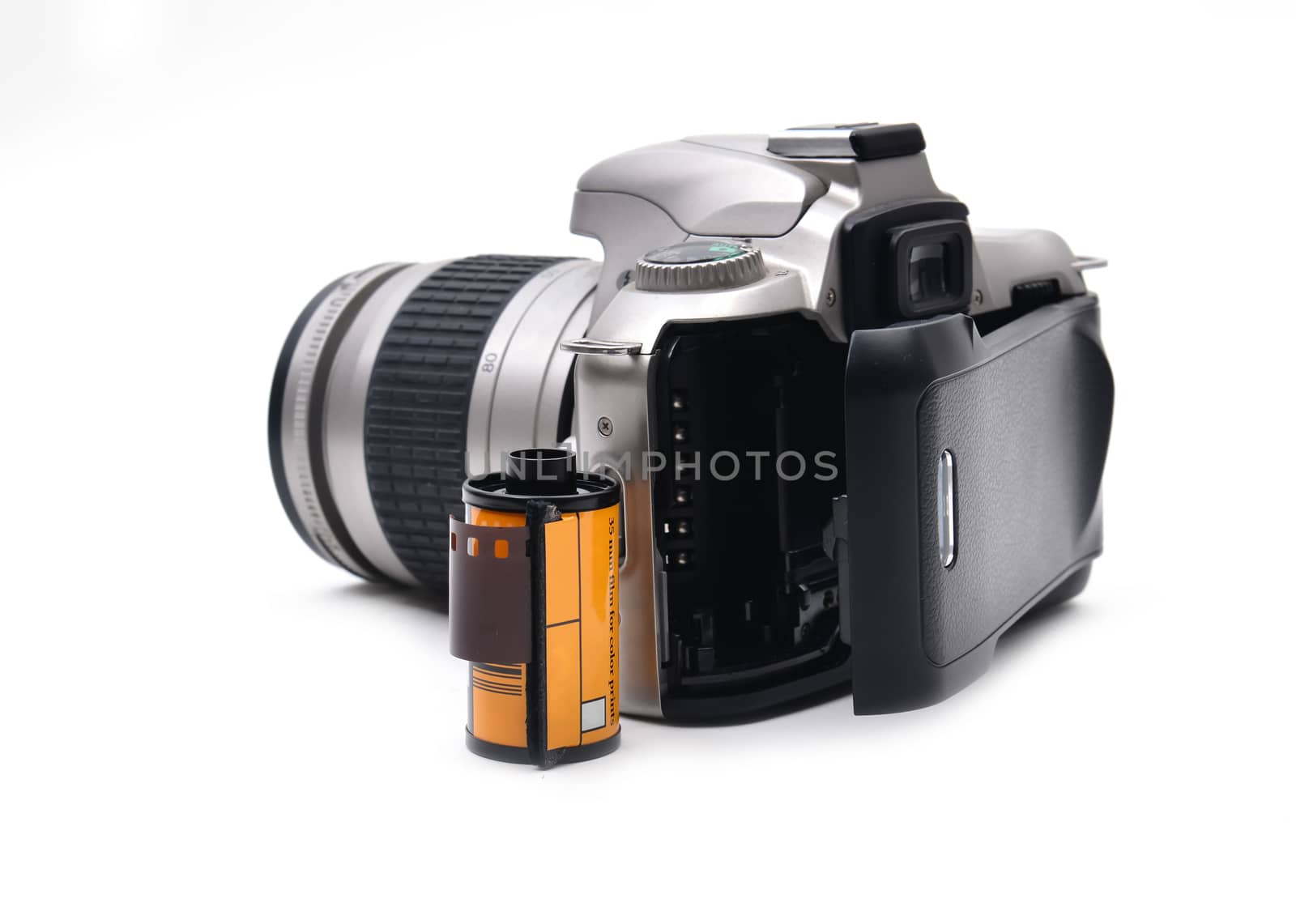 camera with 35 mm film on white background