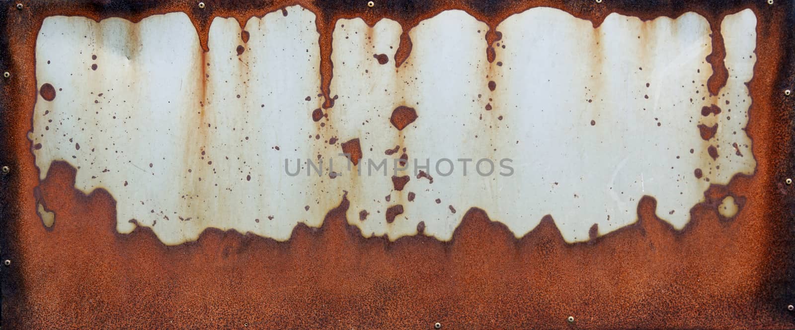 light grey metal panel with rust pattern