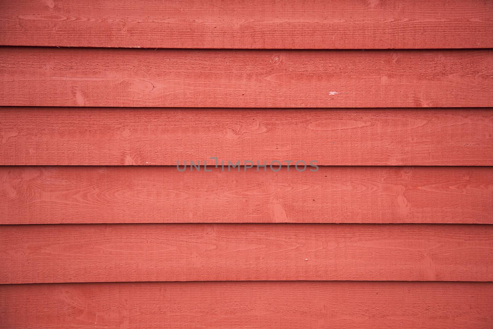 horizontal picture of  horizontal planks with bright red paint