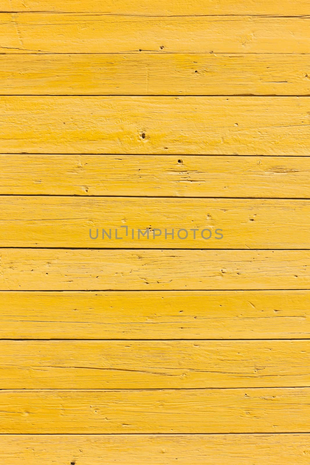 old planks with bright yellow paint by ahavelaar