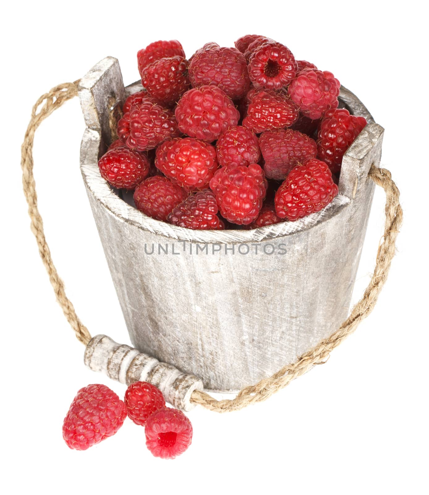 Fresh raspberry in the wooden bucket by Bedolaga