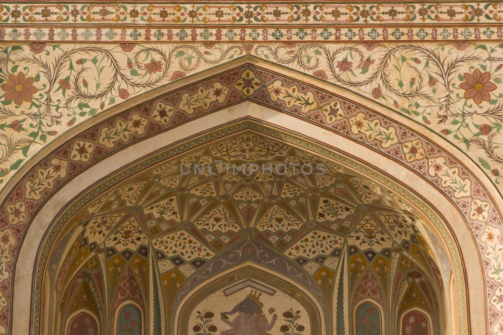 Detail of ornately decorated gateway (Ganesh Pol) inside Amber Palace, Jaipur, Rajasthan, India