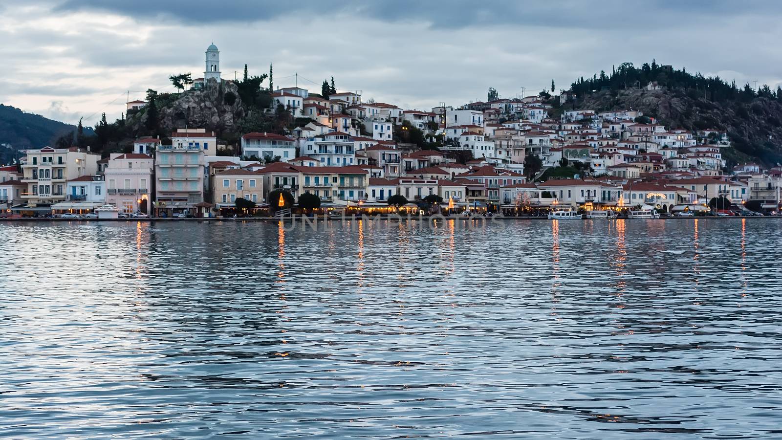 Greece, the port of Poros island at dusk