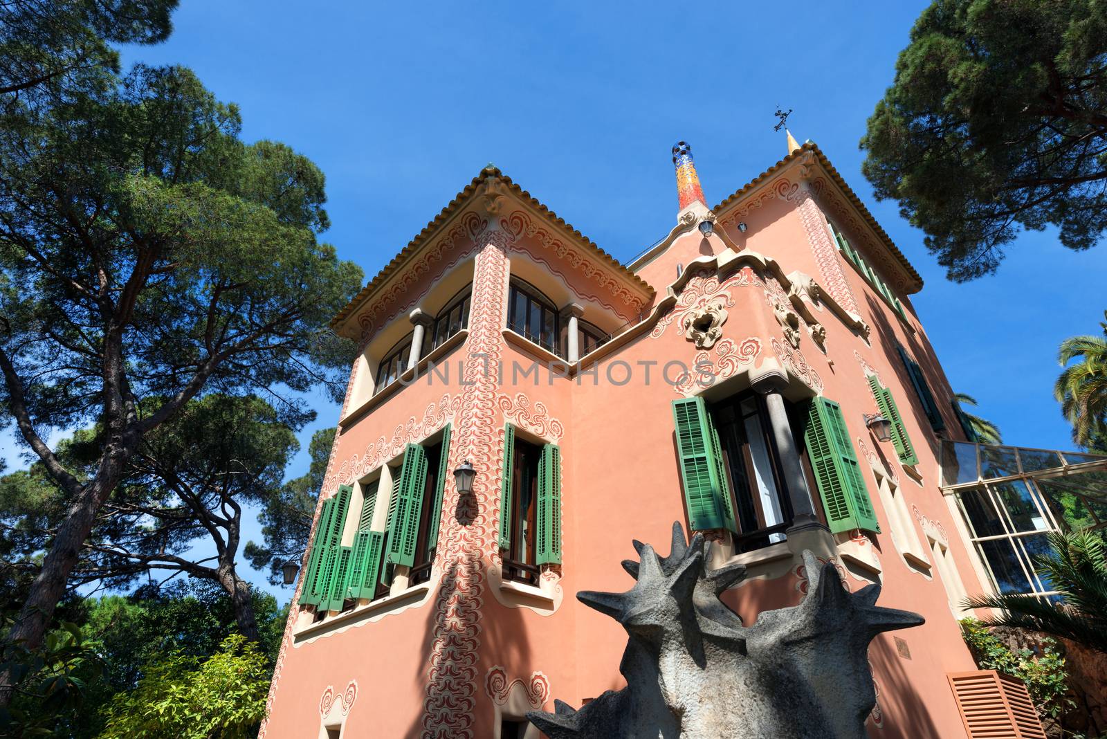 BARCELONA, SPAIN - JUNE 10, 2014: house of Antoni Gaudi and museum in the Park Guell on June 10, 2014 in Barcelona. The park is with other works of Gaudi part of the Unesco world heritage sites. 