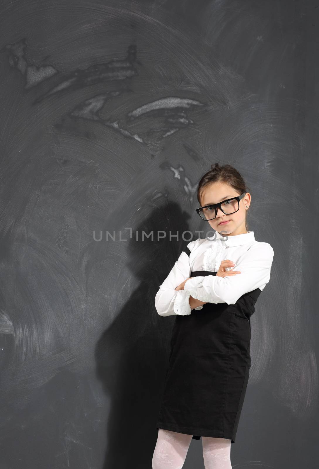 Schoolgirl at the blackboard . by robert_przybysz