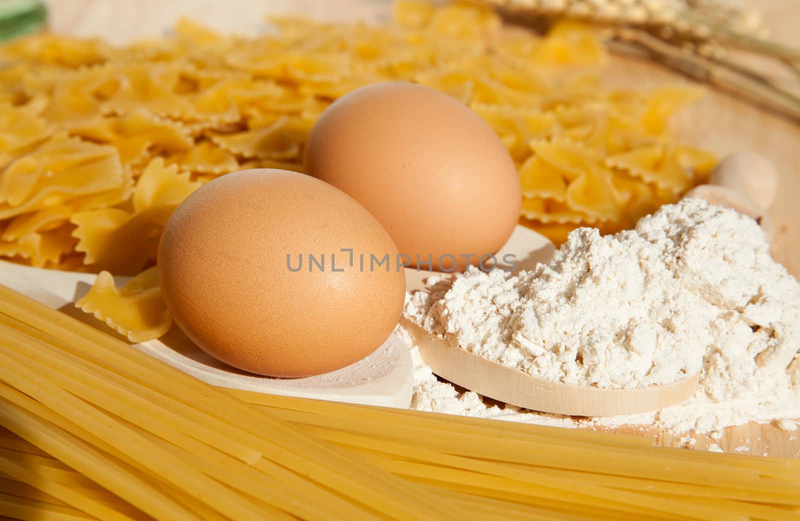 Food background: macaroni, spagetti, egg, flour, wheat
