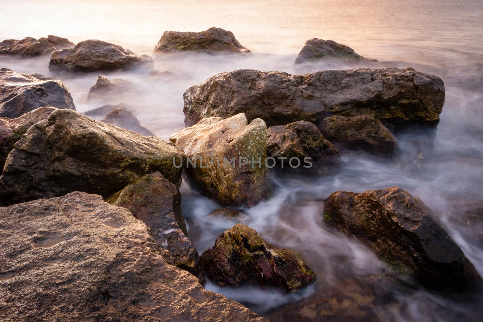 long exposure of sea rocks in the morning