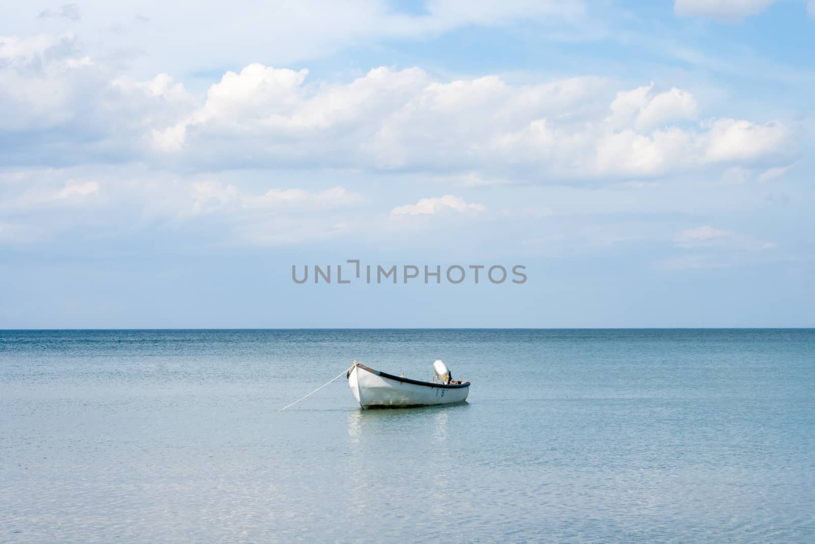 sea with boat and sky whit clouds landscape on summer day