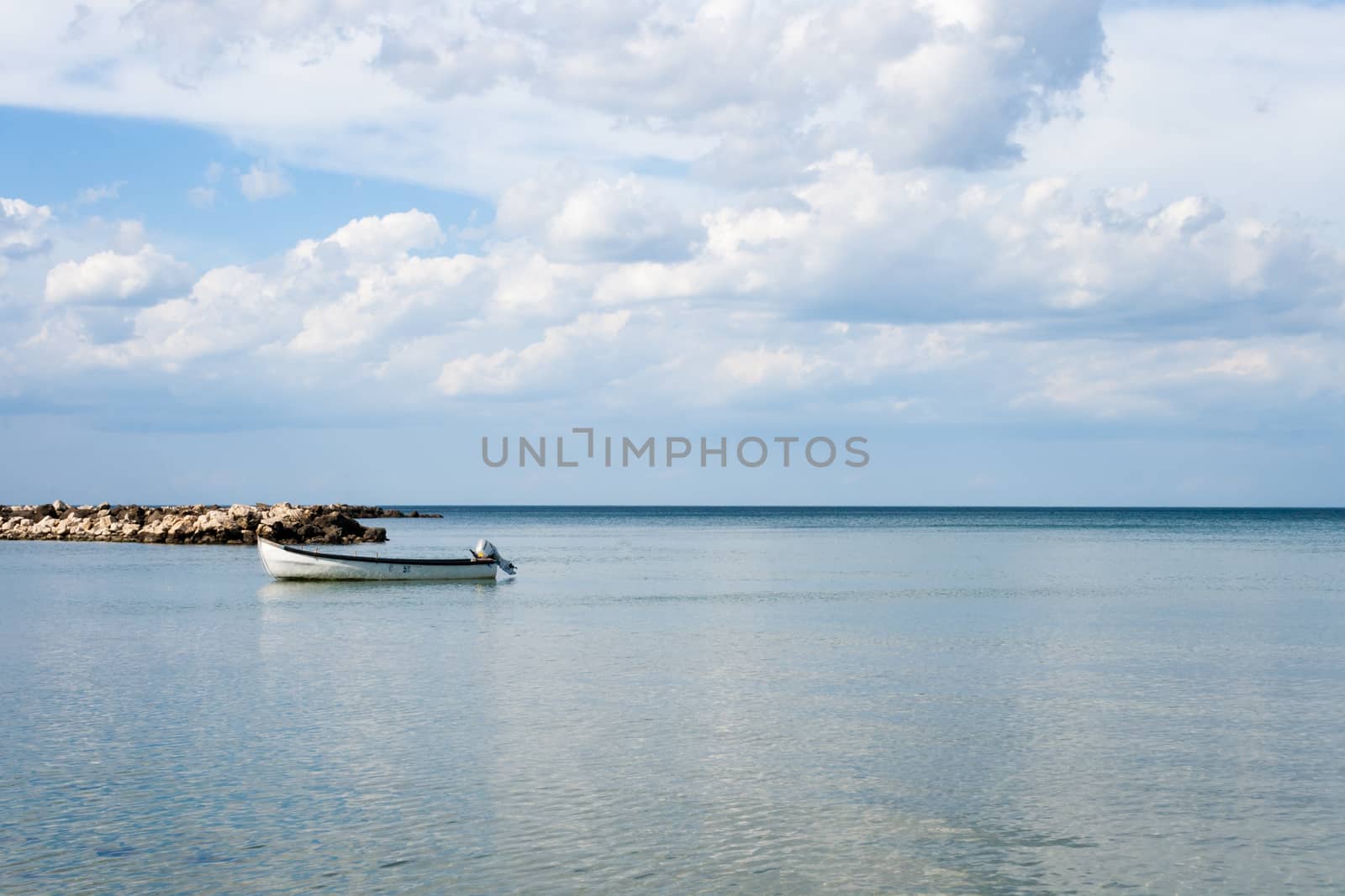 sea with boat and sky whit clouds landscape on summer day