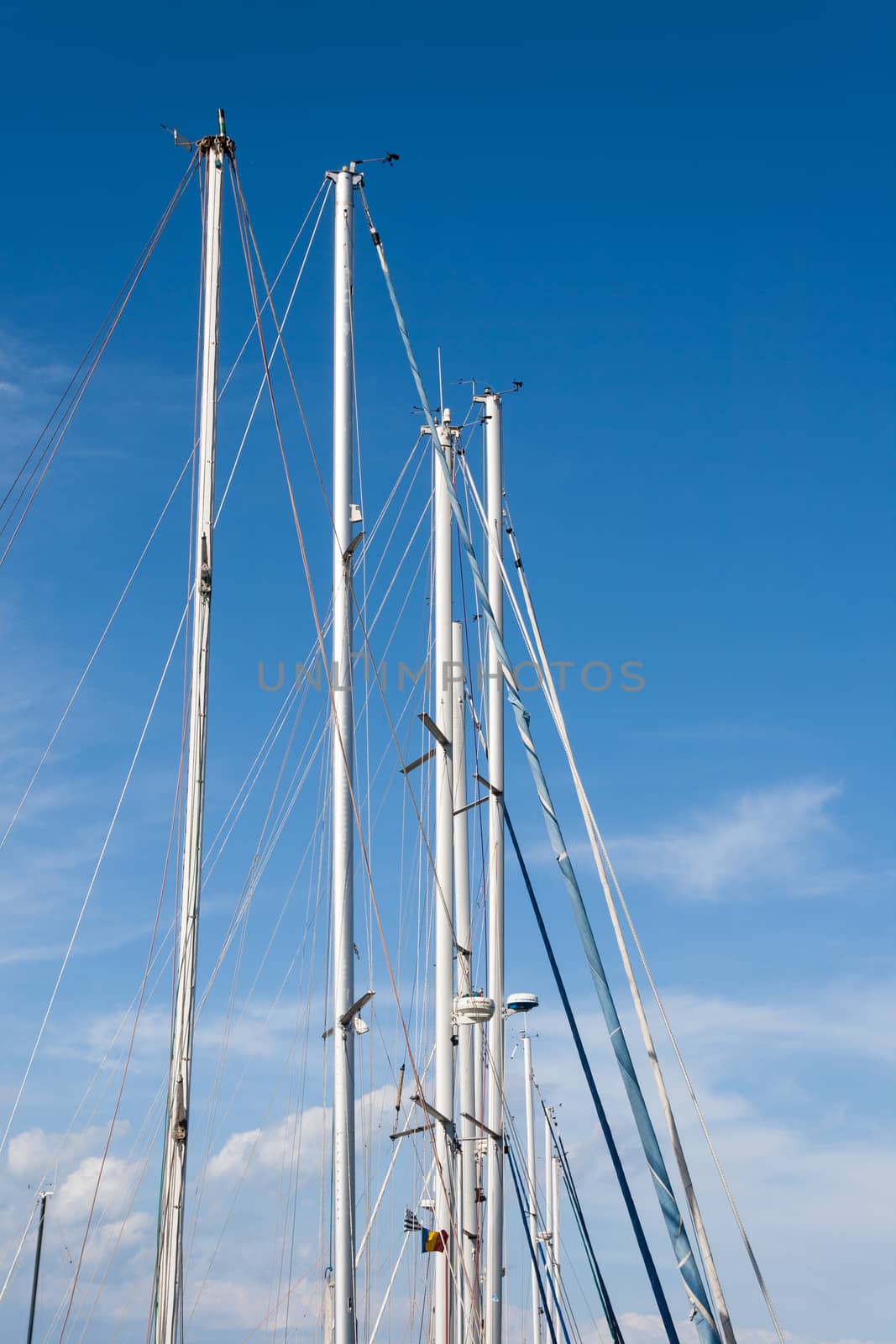 sail ship mast with blue sky in background