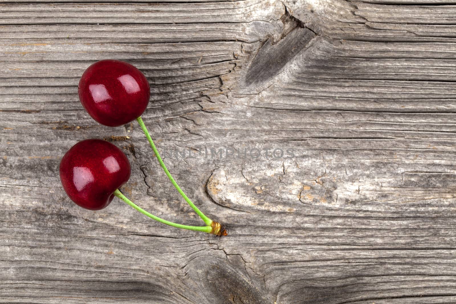 Sweet cherry, on wooden background