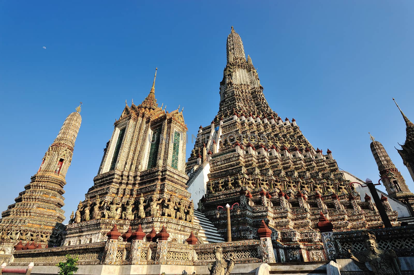 Temple Wat Arun near Chao Phraya River Bangkok Thailand by think4photop