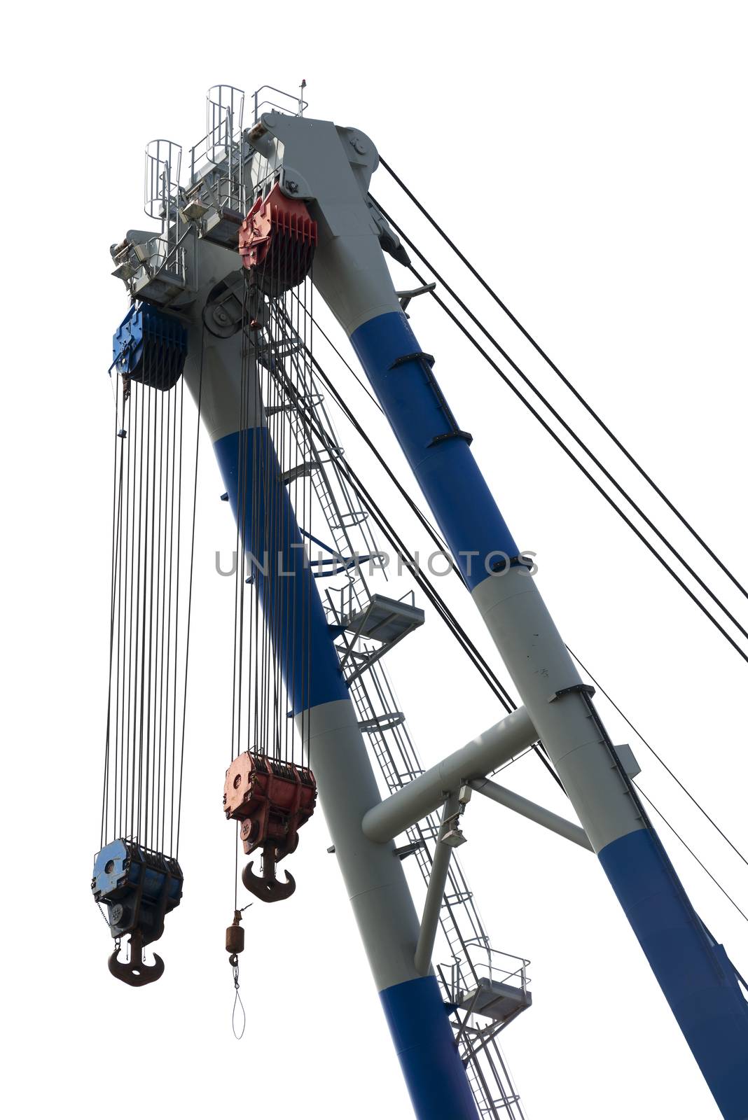 very big crane in rotterdam harborwith pulleys and steel cables