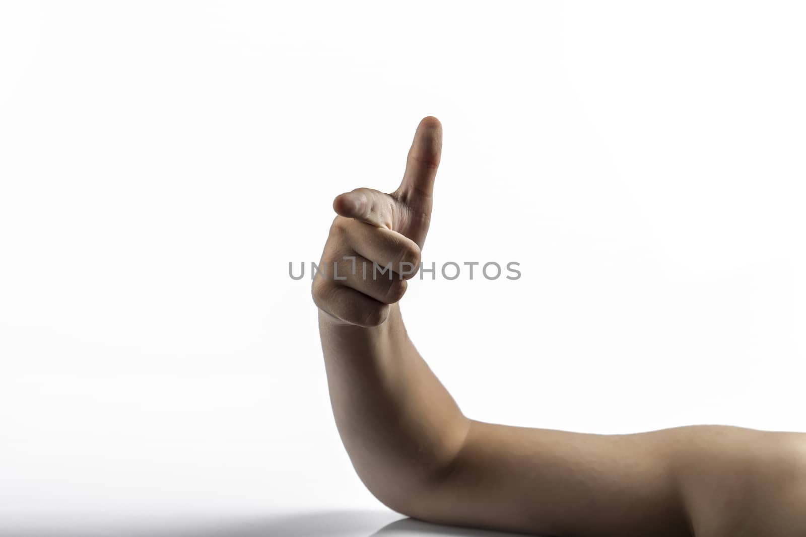 Young hands makes a gesture: number two sign or gun sign