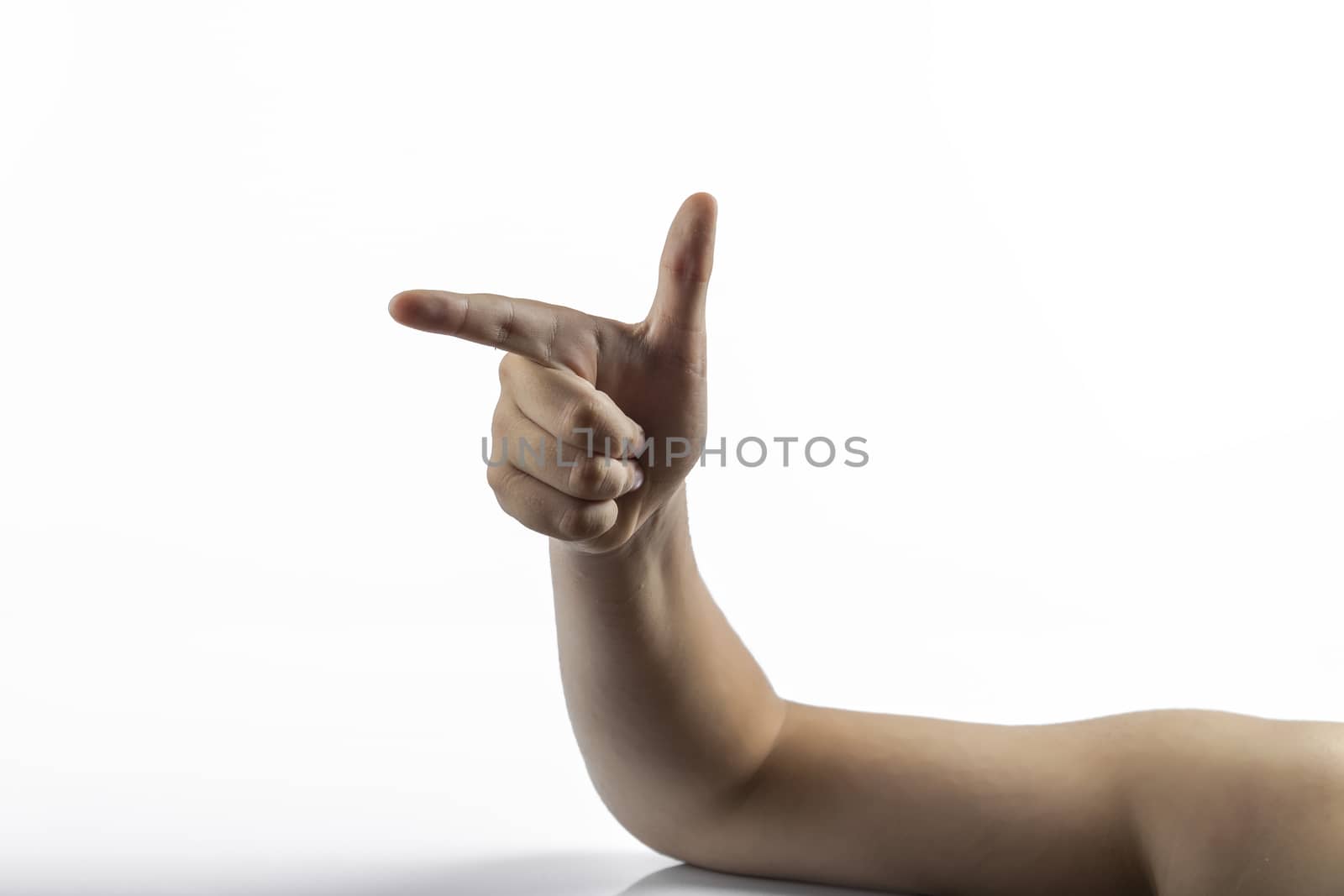 Young hands makes a gesture: number two sign or gun sign