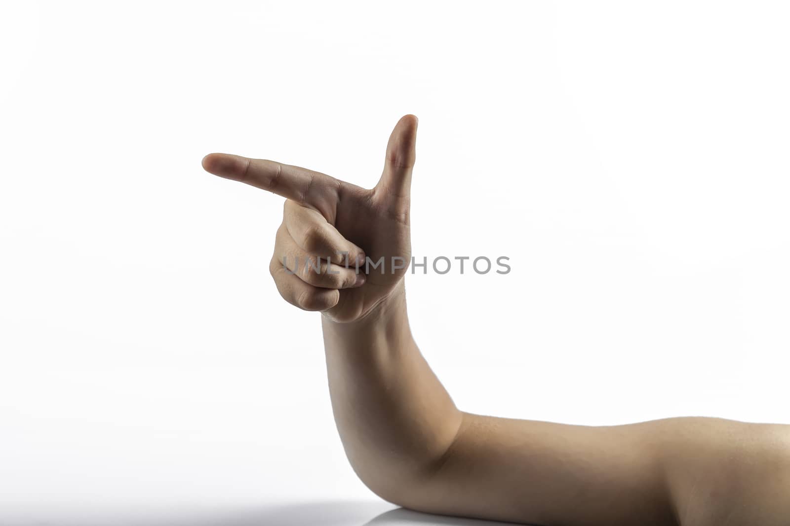 Young hands makes a gesture: number two sign or gun sign