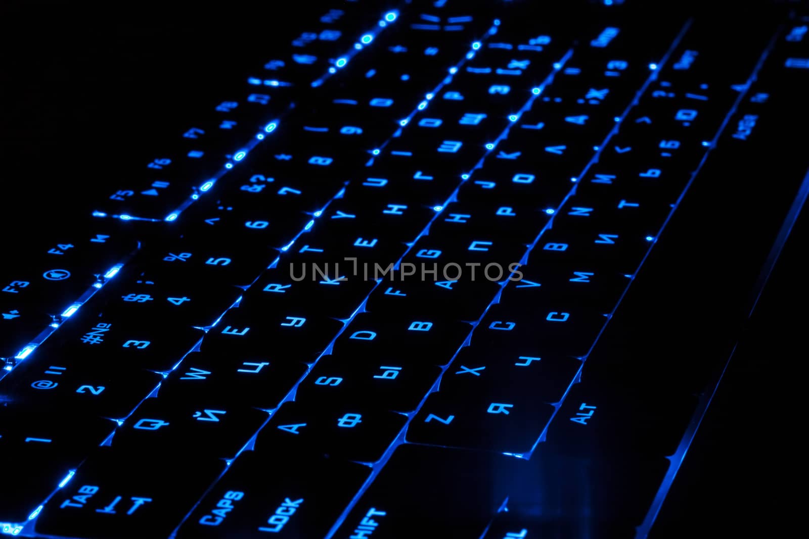 Blue lighting keyboard in the dark