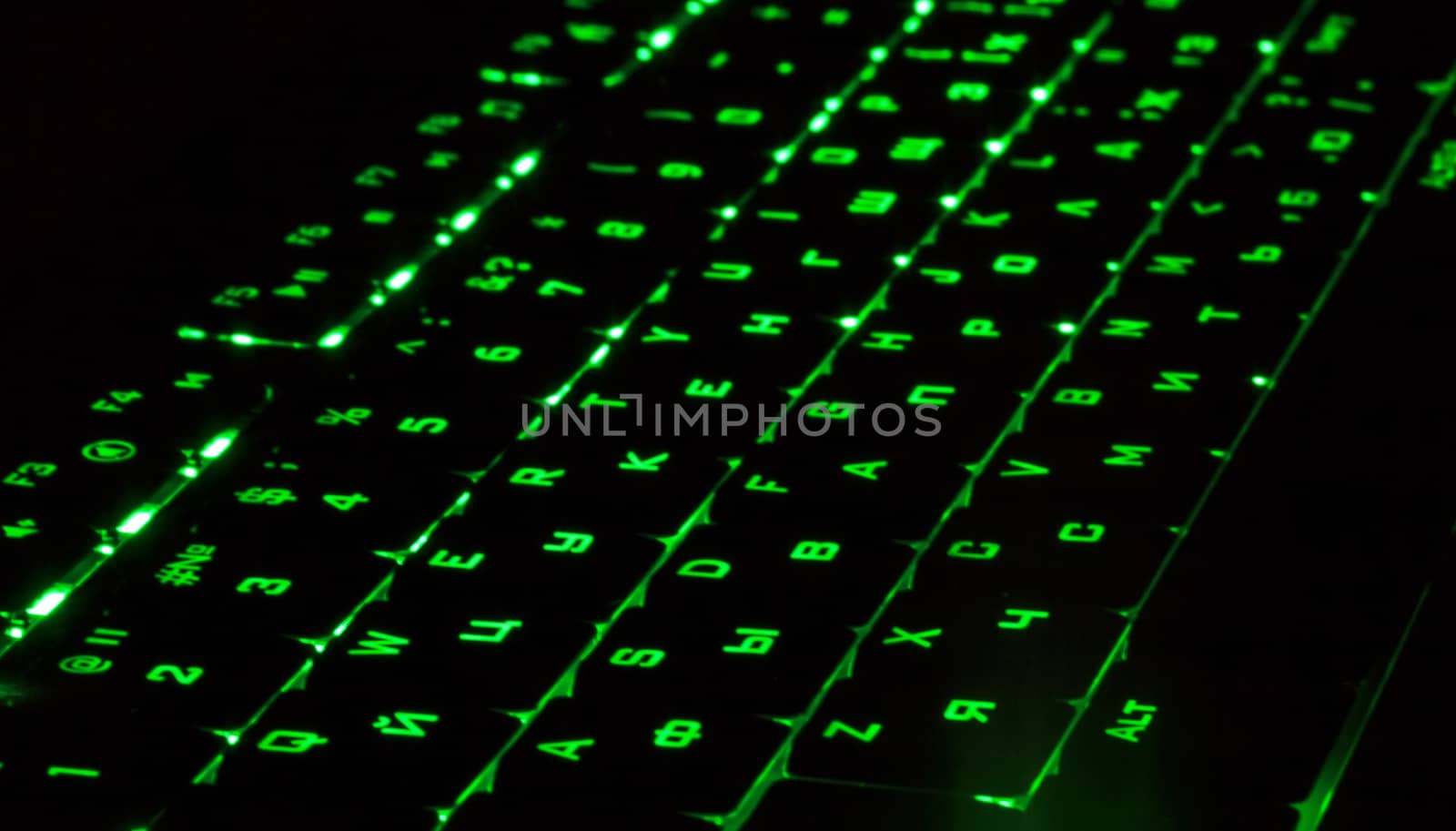 Green lighting keyboard in the dark by RawGroup