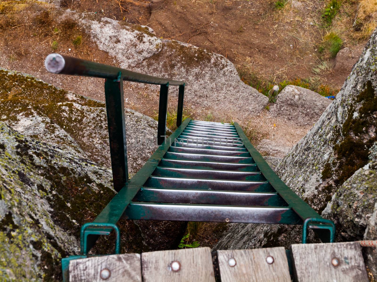 Metal ladder on the rock viewpoint - viwe from above