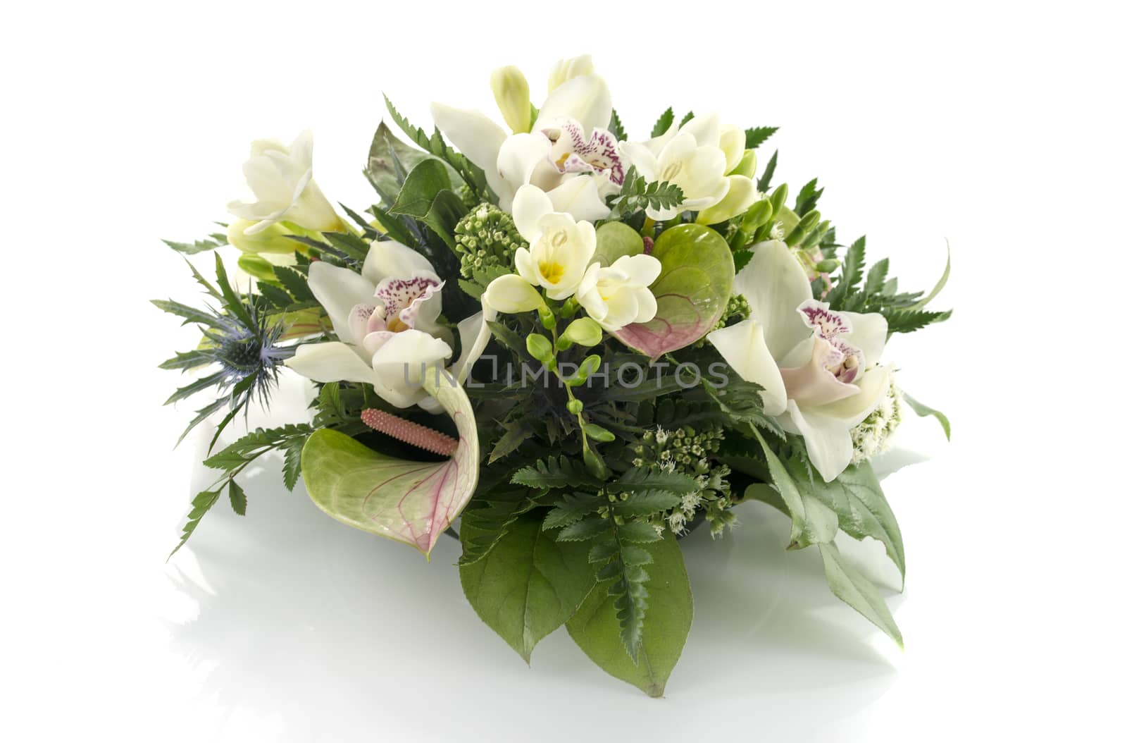 flower arrangement with lilys freesia  by compuinfoto