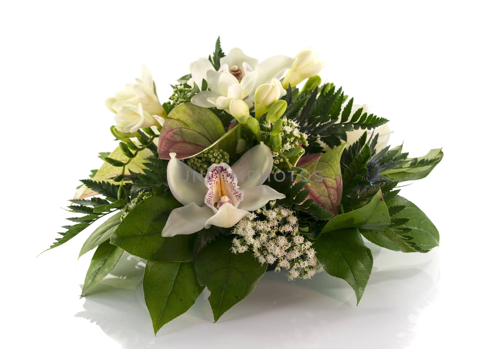 flower arrangement with lilys and freesia by compuinfoto