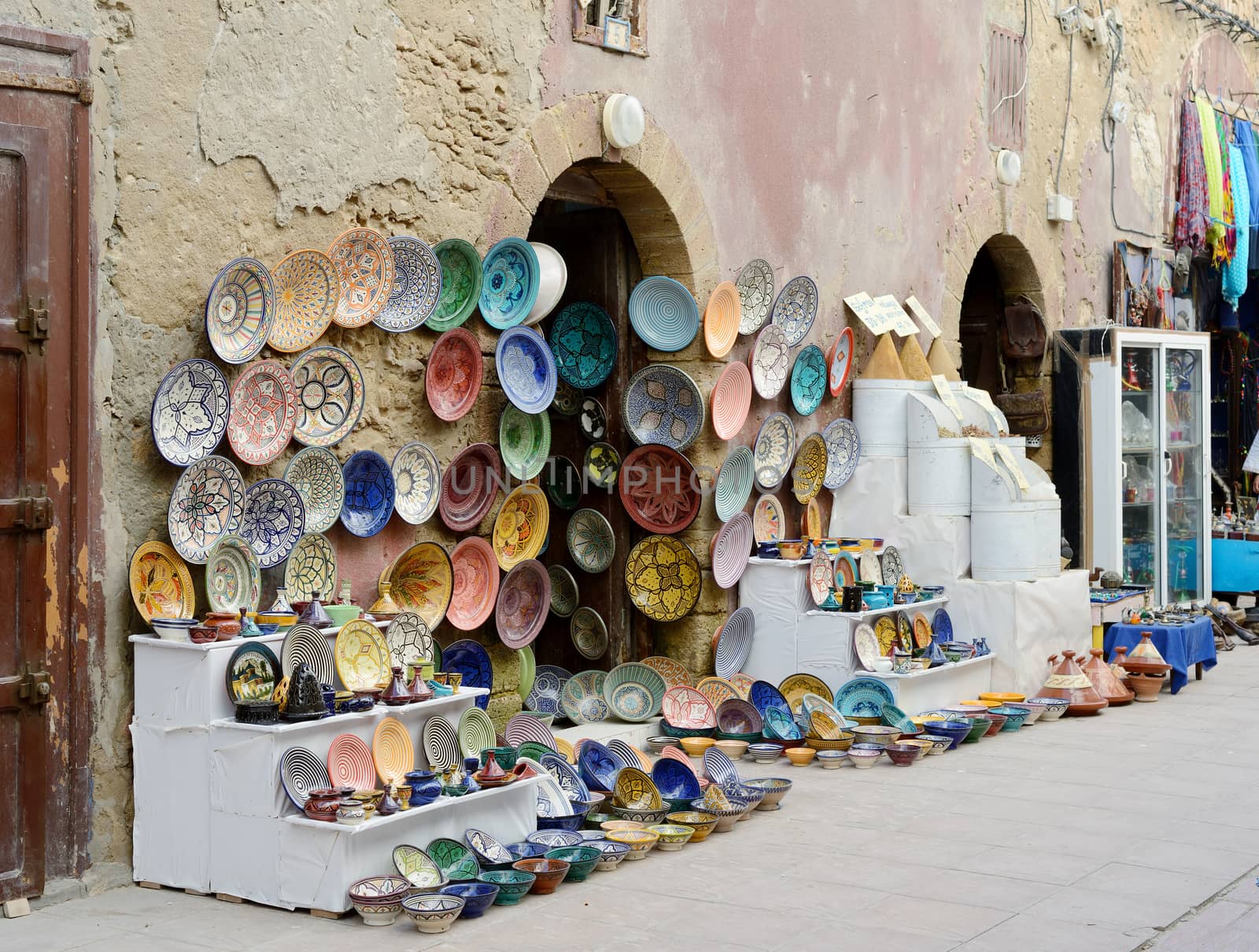 Morocco shop front showing handmade crafts and pottery