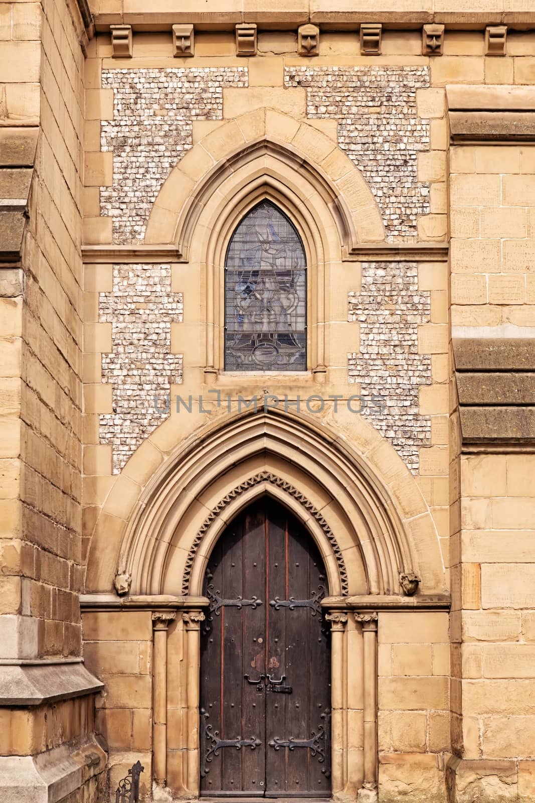 Detail from the facade of Southwark Cathedral in London by mitakag