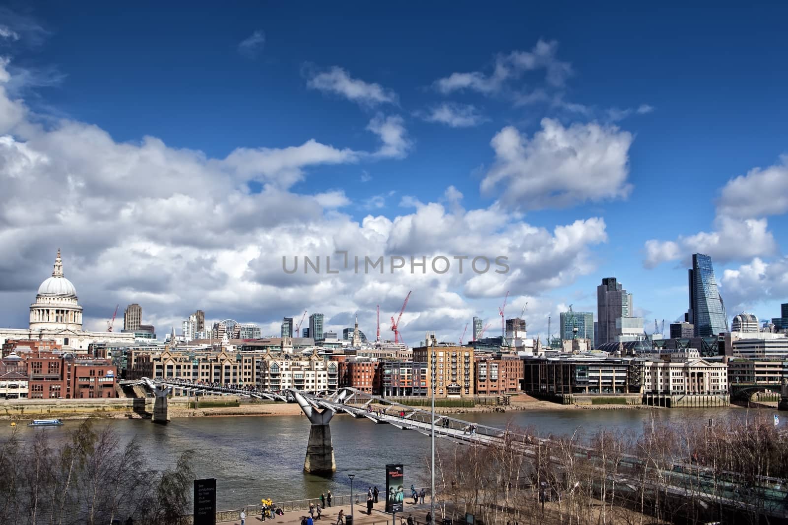 St Paul's Cathedral and Millennium Bridge in London by mitakag