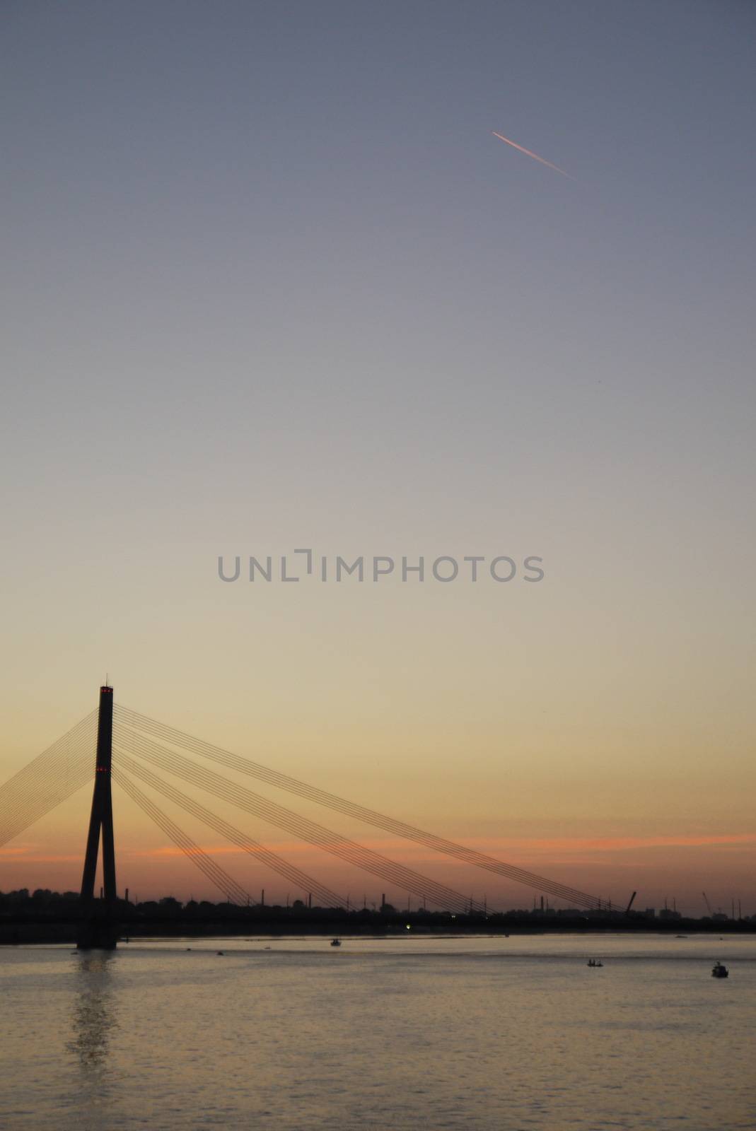 Vant bridge at night. Riga, Latvia, river Daugava