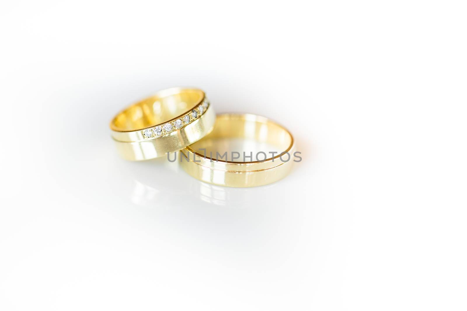 Wedding day details - two lovely golden wedding rings by viktor_cap