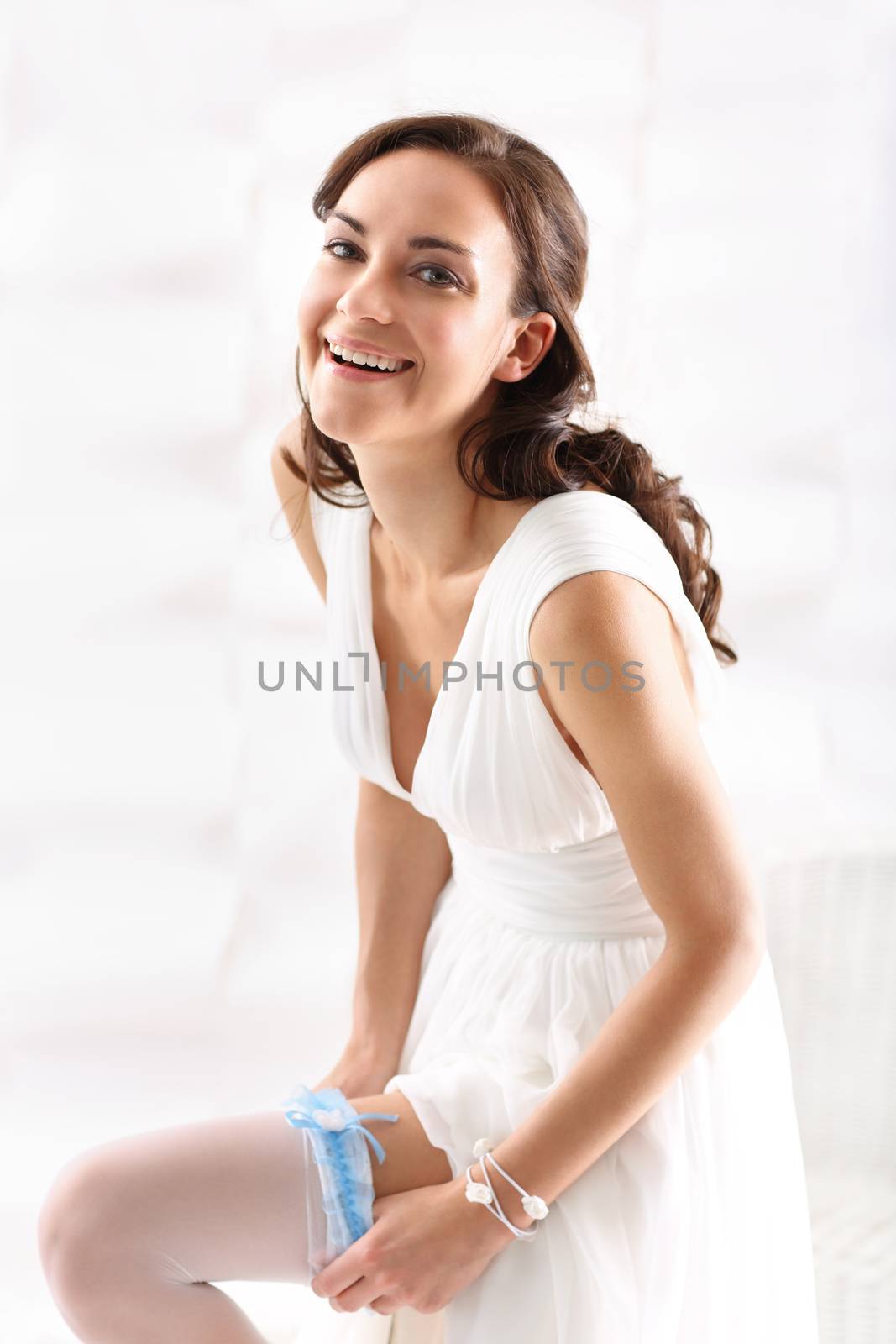 Bride in a white dress in a romantic scenery