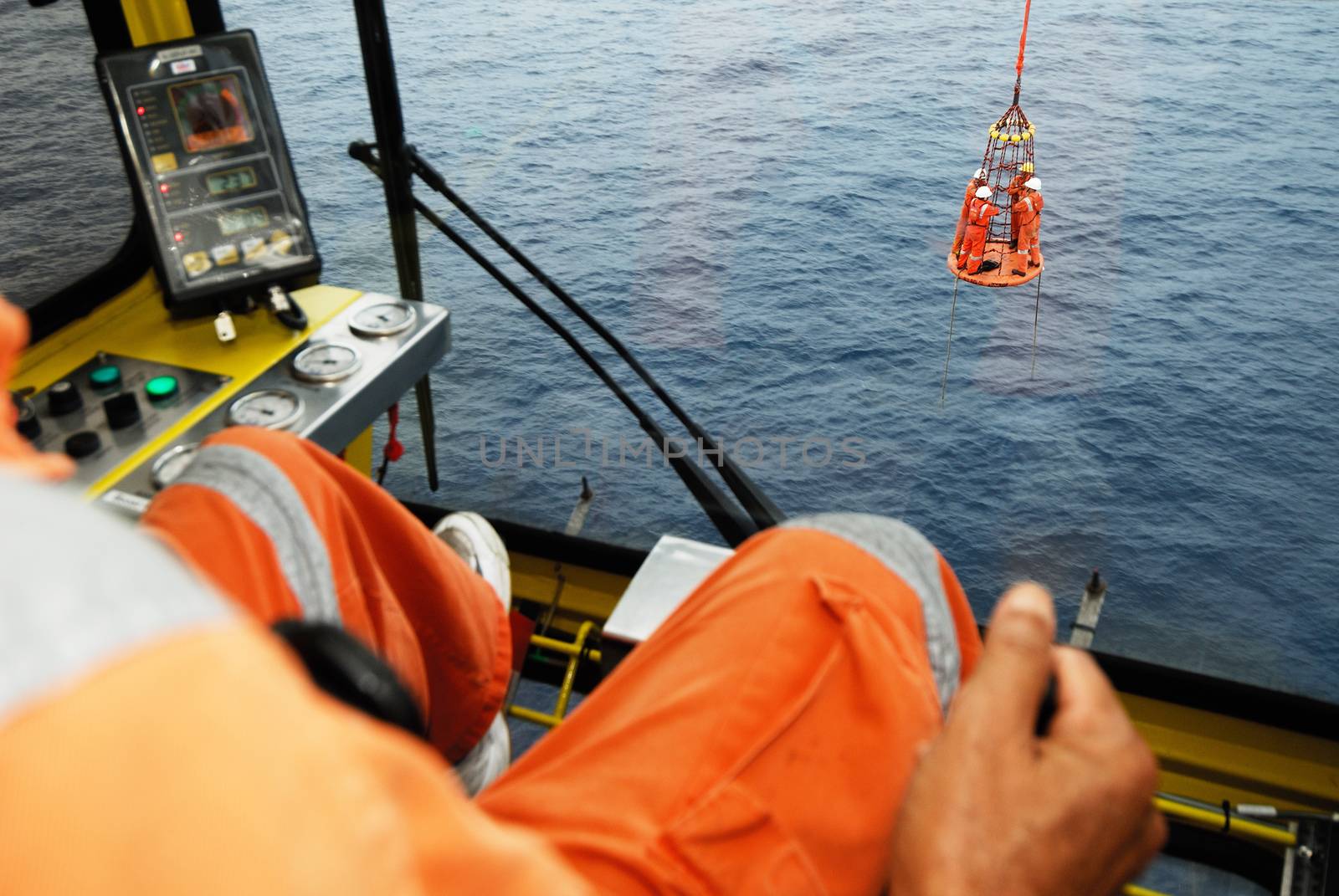 offshore worker on the platform rig by think4photop