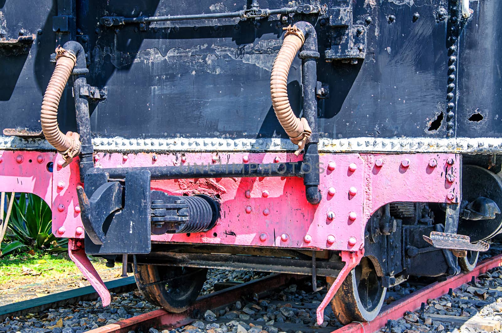 Vintage steam locomotive by NuwatPhoto