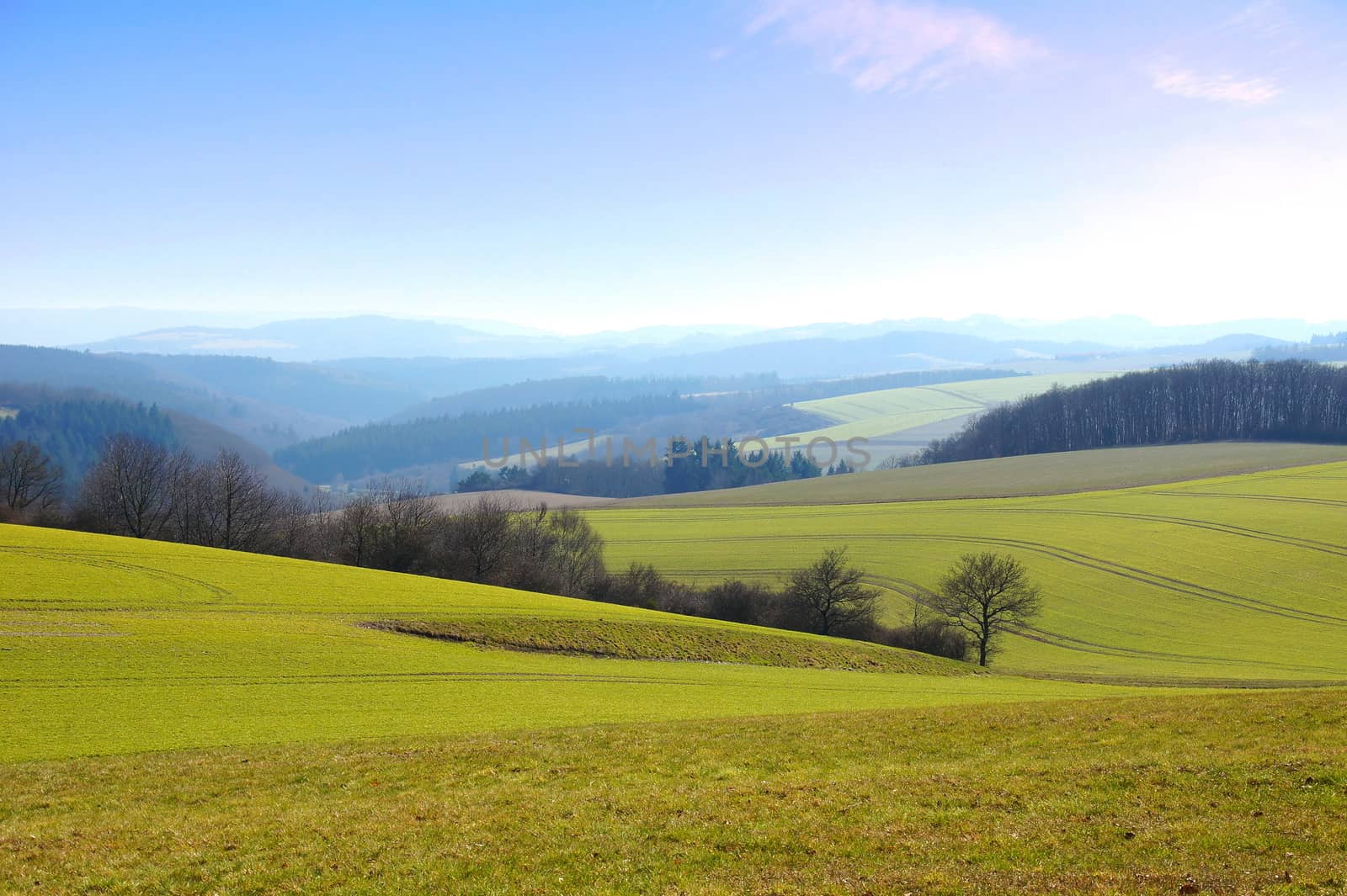 eastern Hunsrück near Niederhosenbach in April, fields and forests are still bare