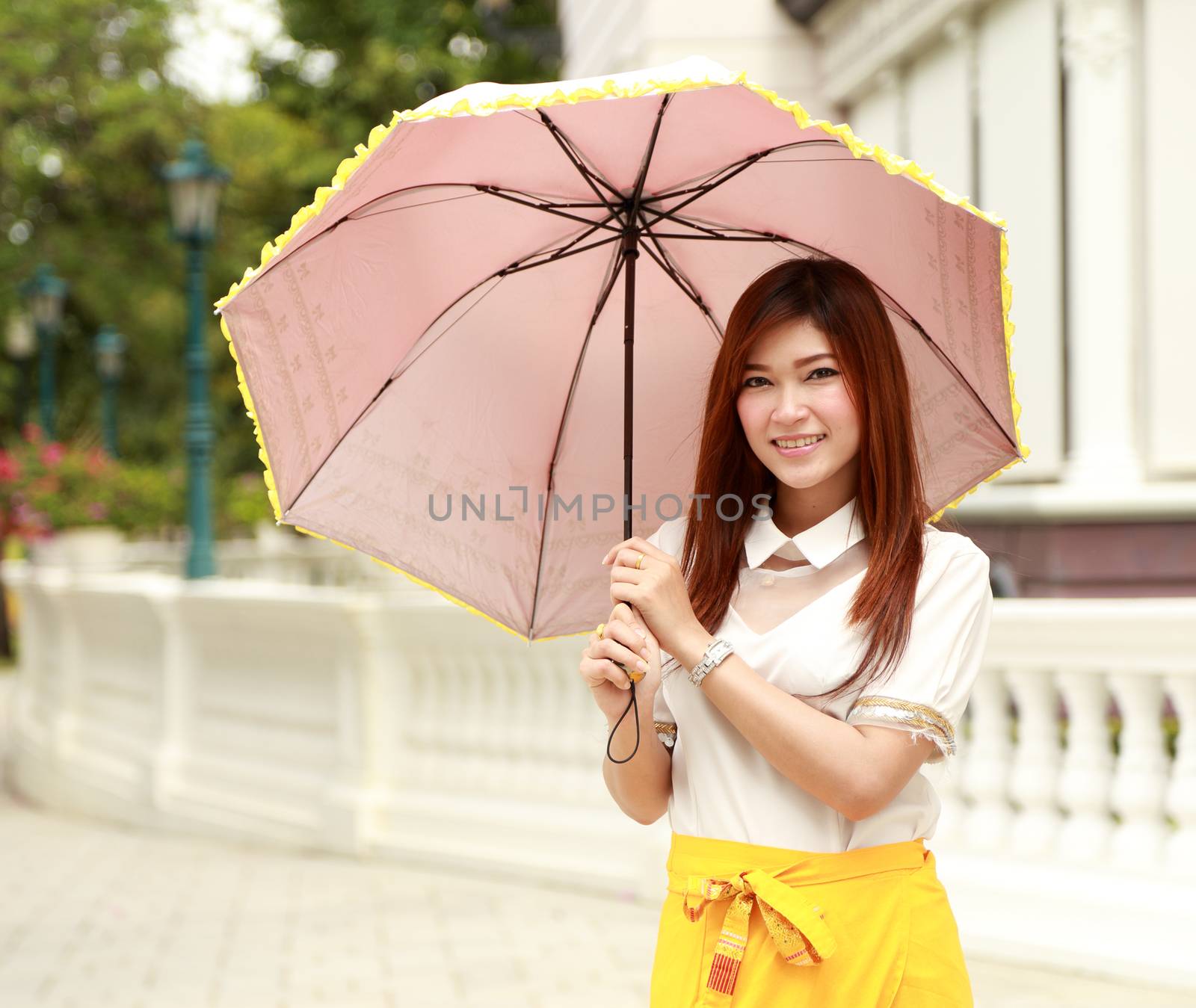 Thai girl dressing and umbrella with traditional style by geargodz
