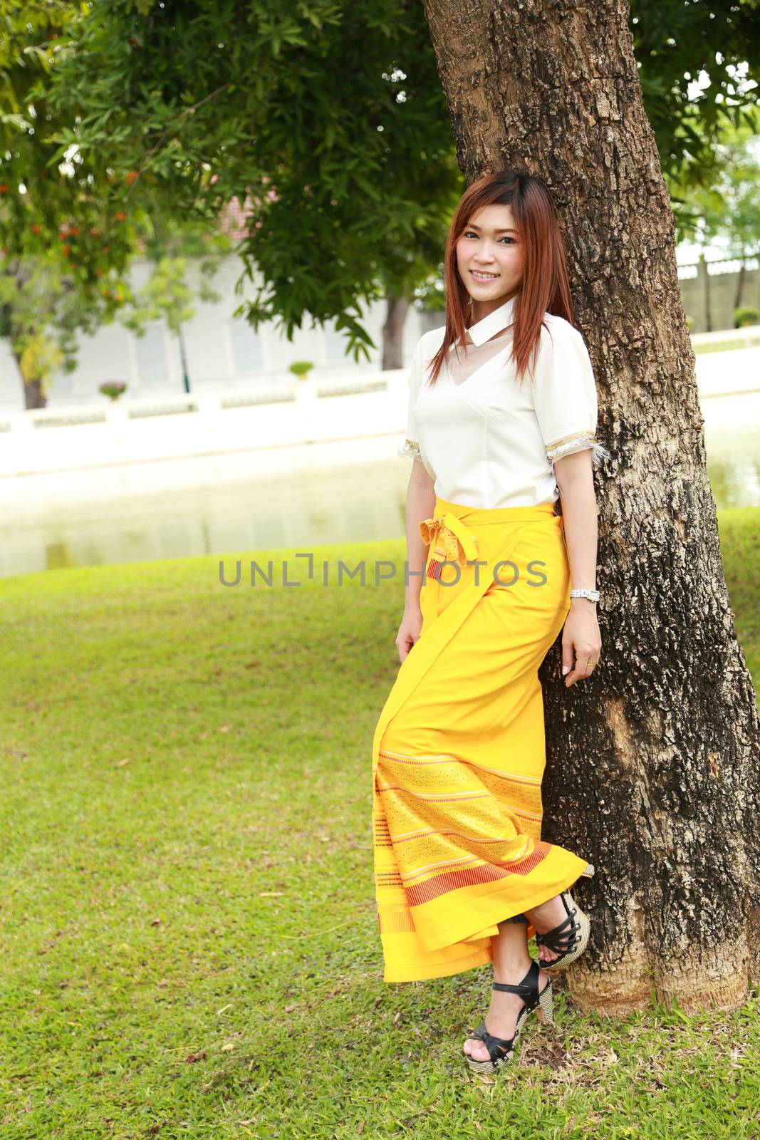 Thai women dressing with traditional style (garden background)