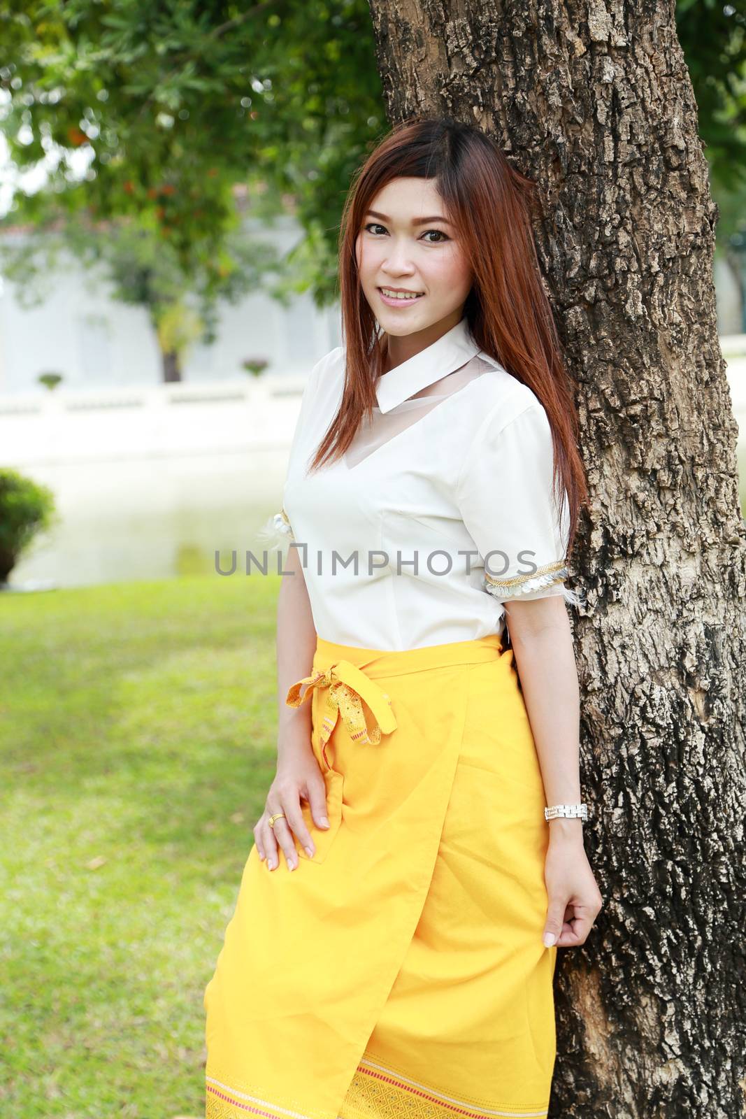 Thai women dressing with traditional style (garden background)