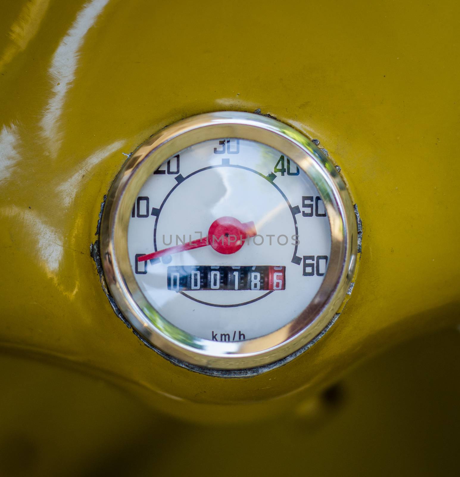 Mustard Yellow Vintage Retro Speedometer On A Moped Or Scooter