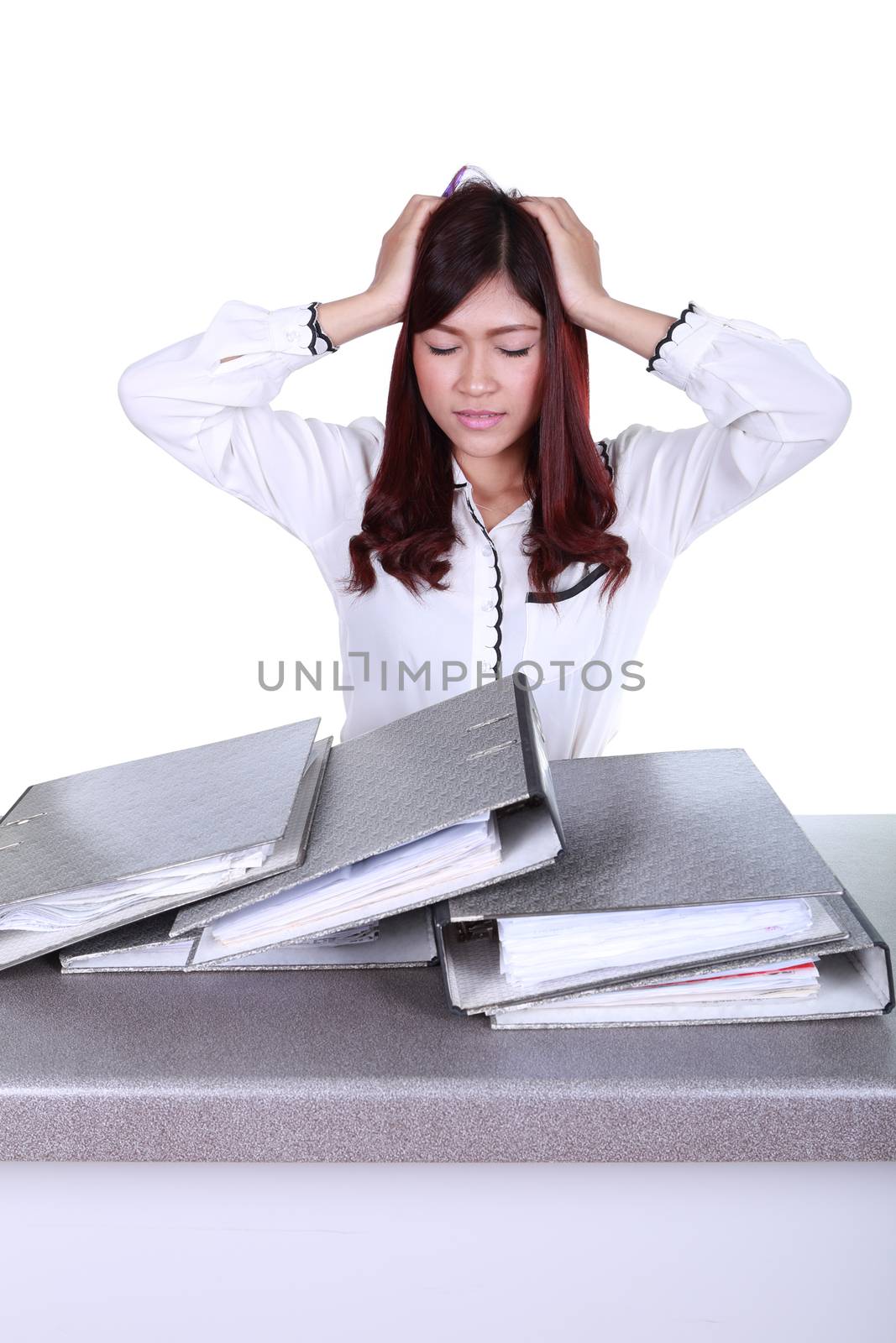 business woman worried with folder documents on desk isolated on white background