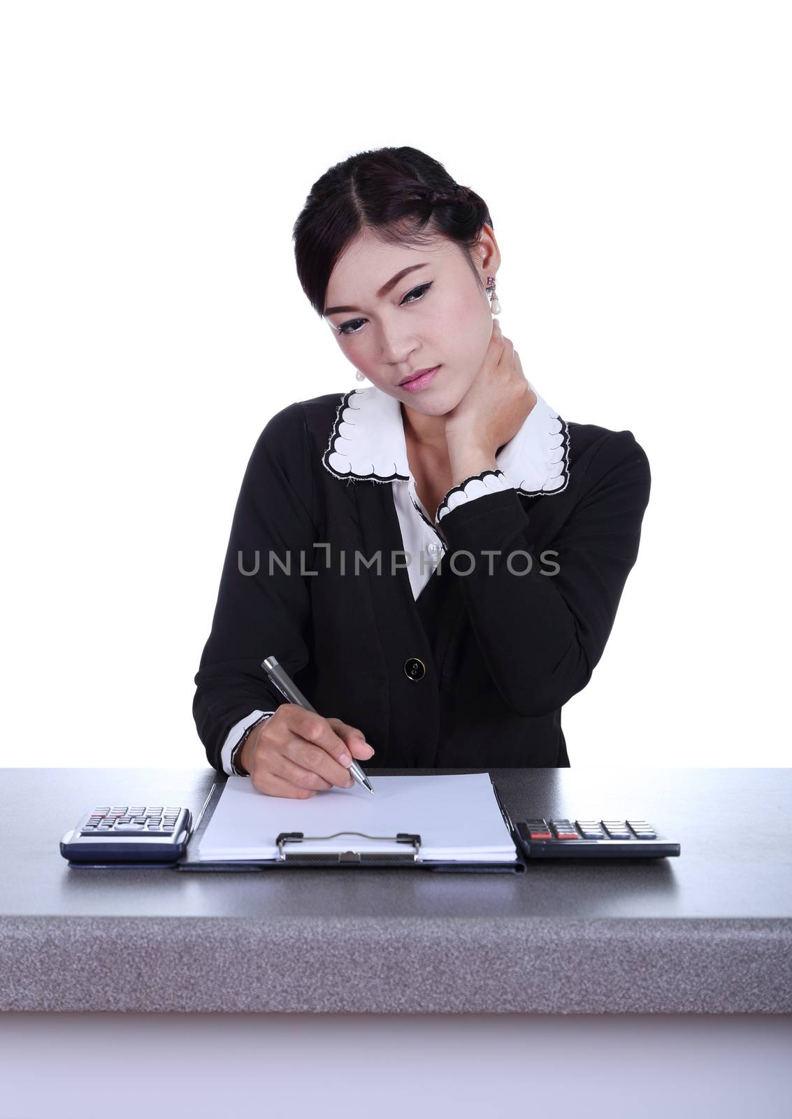 business woman sitting on her desk holding a pen working with do by geargodz