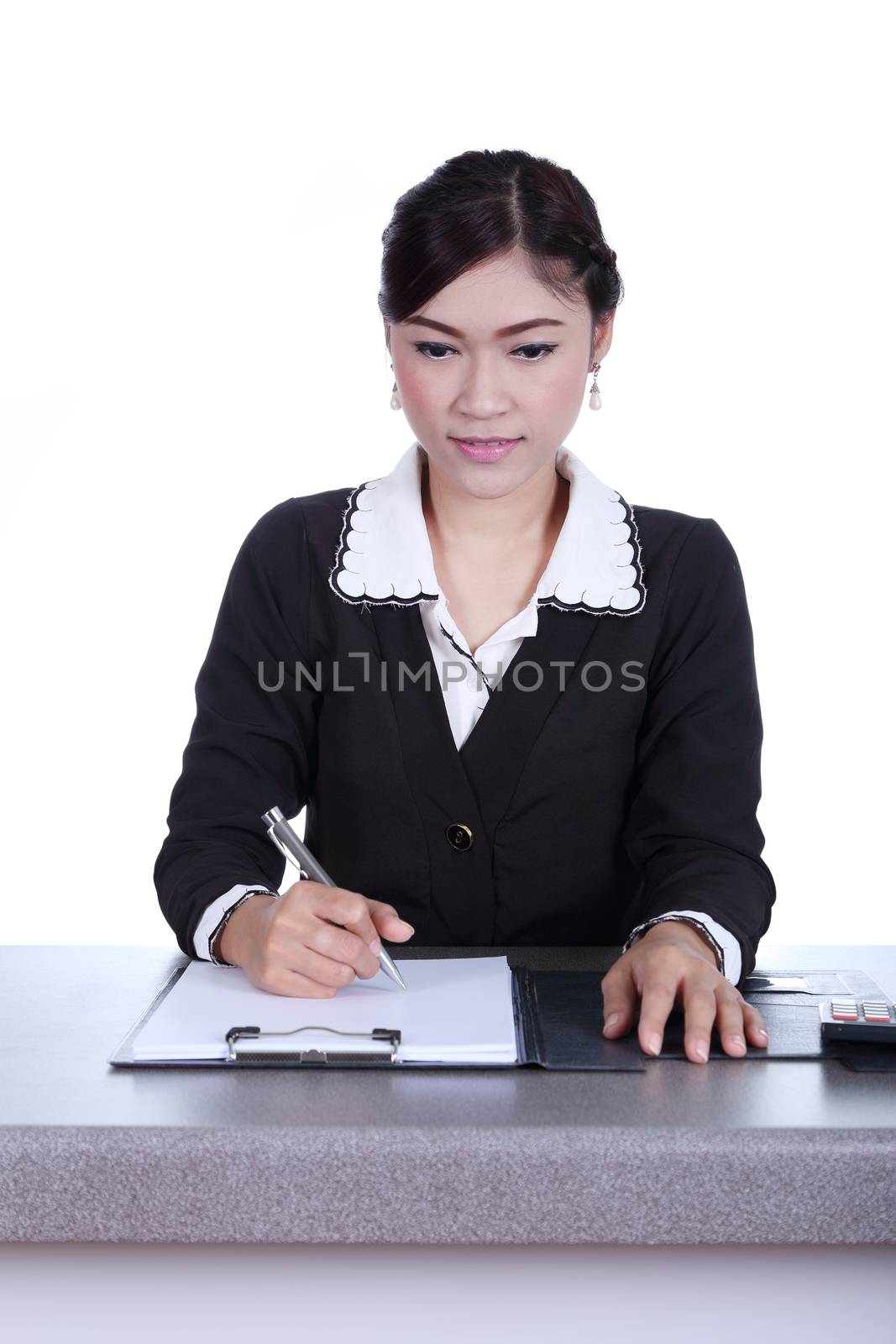 business woman sitting on her desk holding a pen working with documents sign up contract isolated on white background