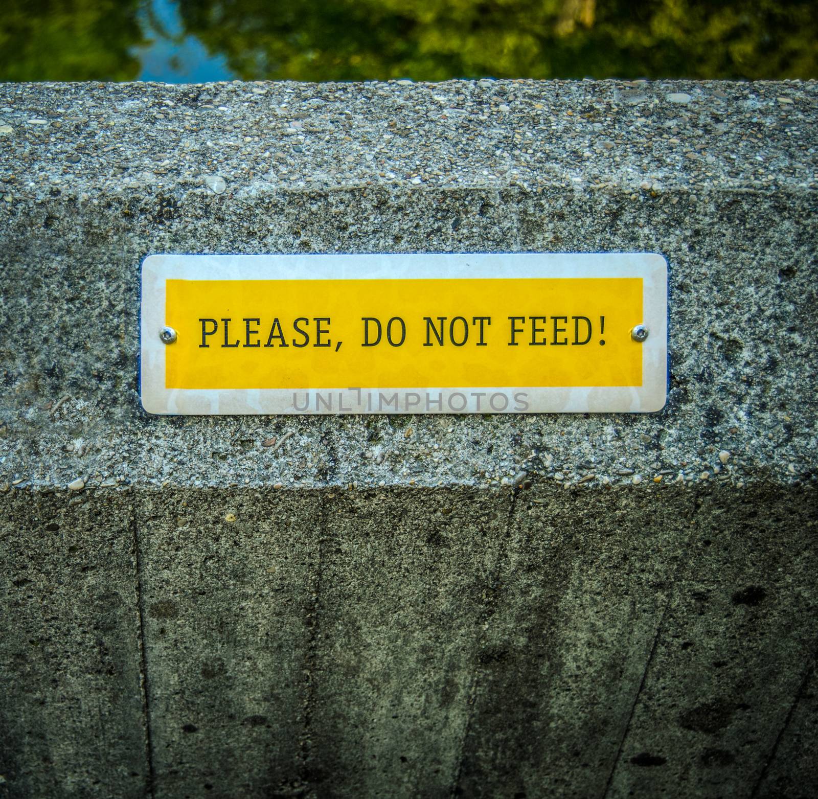 Conceptual Image Of A Do Not Feed Sign At A Zoo