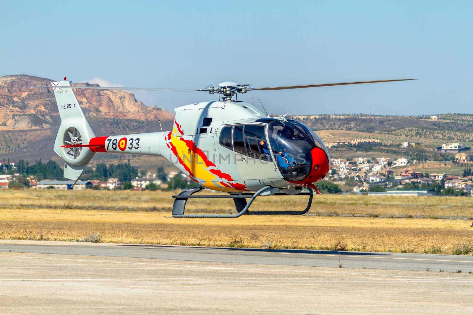 GRANADA, SPAIN-MAY 18: Helicopters of the Patrulla Aspa taking part in a exhibition on the X Aniversary of the Patrulla Aspa of the airbase of Armilla on May 18, 2014, in Granada, Spain