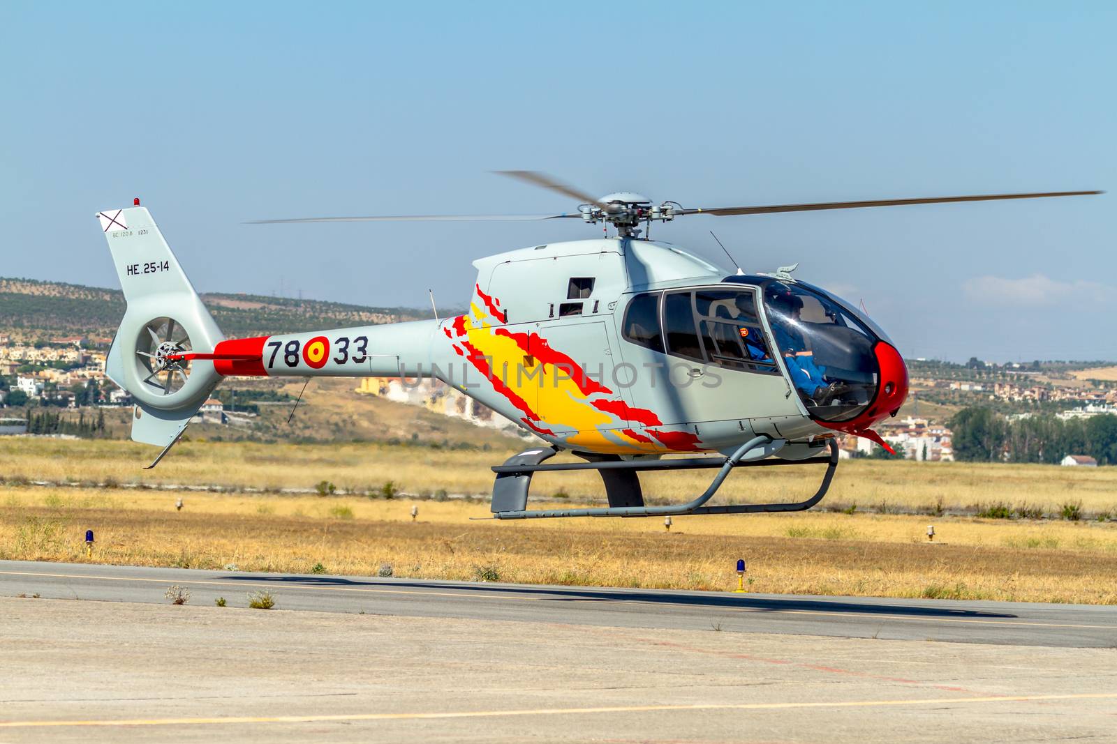 GRANADA, SPAIN-MAY 18: Helicopters of the Patrulla Aspa taking part in a exhibition on the X Aniversary of the Patrulla Aspa of the airbase of Armilla on May 18, 2014, in Granada, Spain