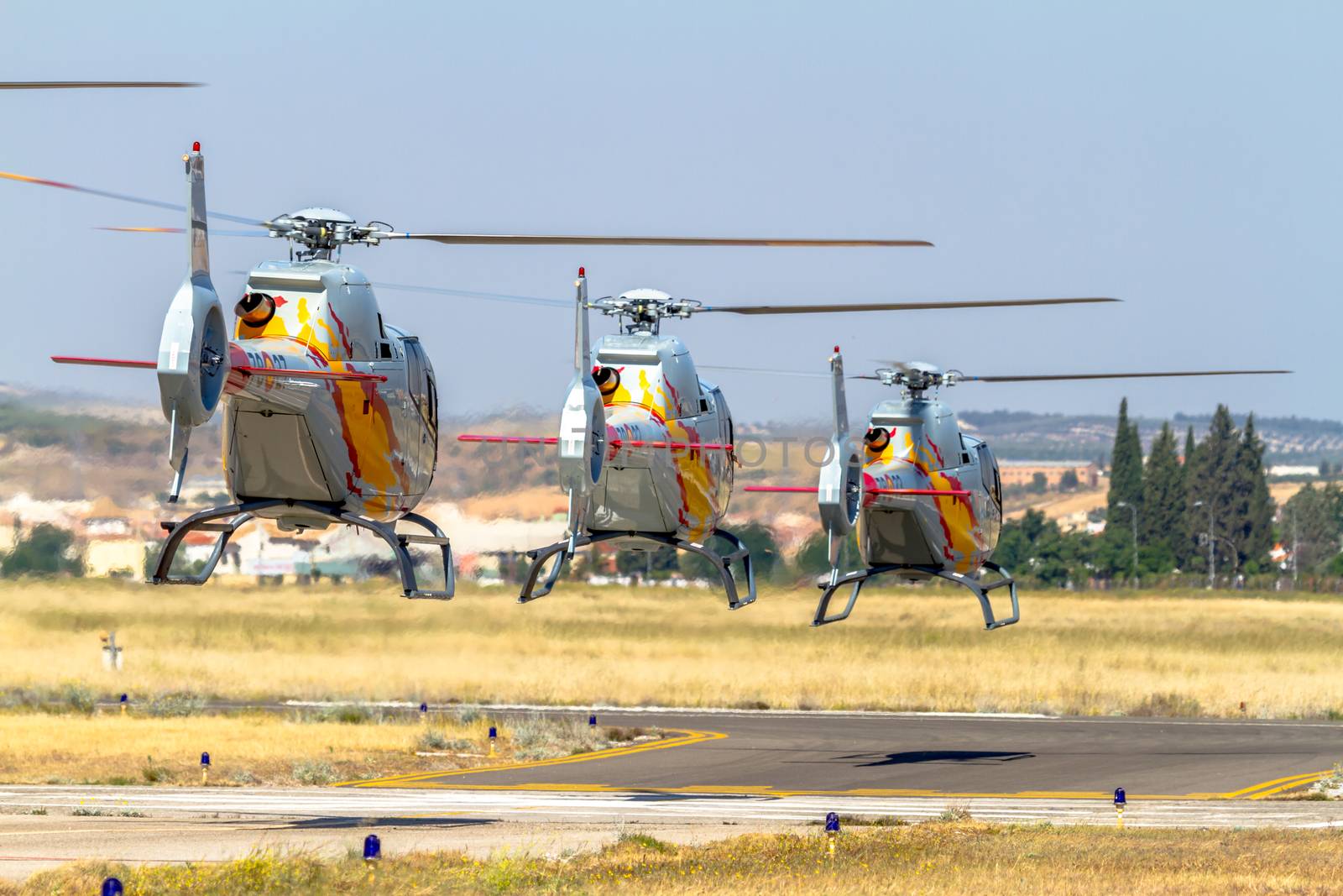 GRANADA, SPAIN-MAY 18: Helicopters of the Patrulla Aspa taking part in a exhibition on the X Aniversary of the Patrulla Aspa of the airbase of Armilla on May 18, 2014, in Granada, Spain