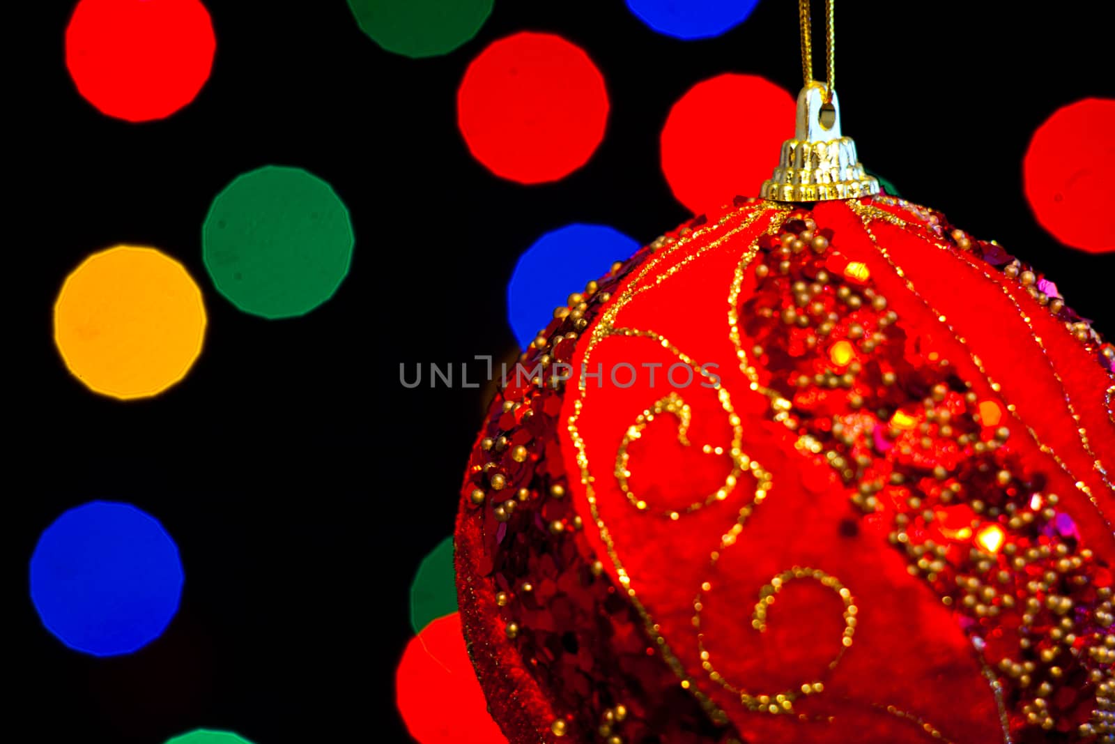 Red Christmas ball with lots of colors light