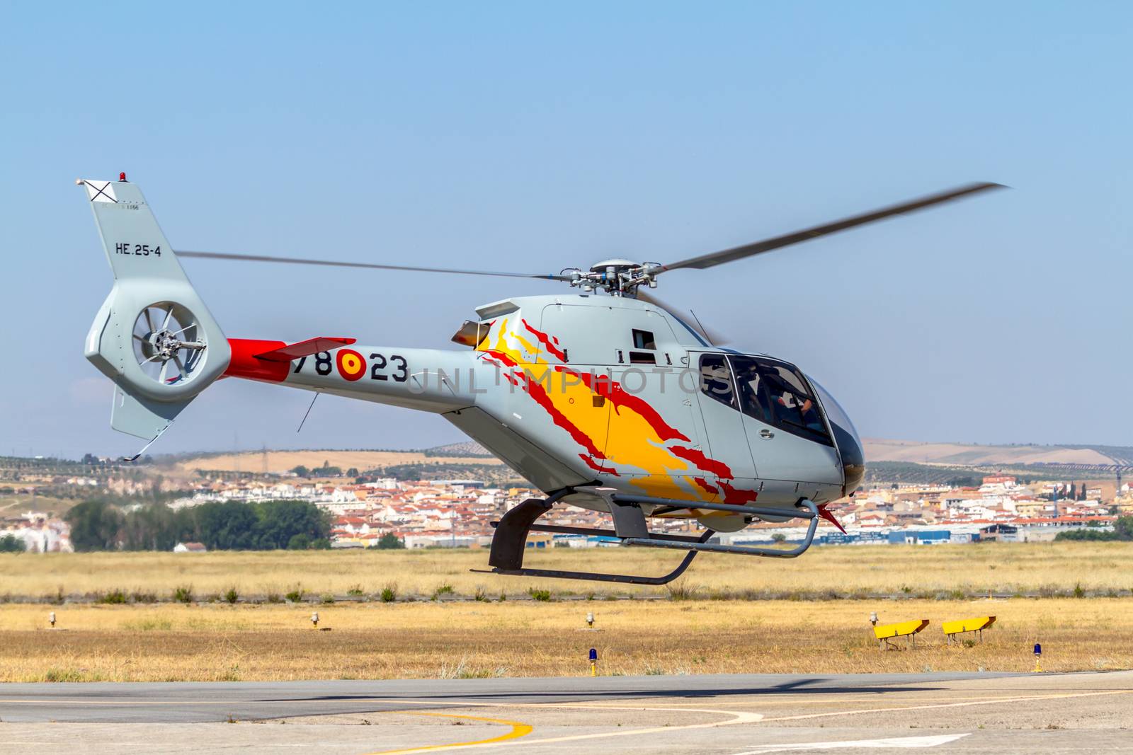 GRANADA, SPAIN-MAY 18: Helicopters of the Patrulla Aspa taking part in a exhibition on the X Aniversary of the Patrulla Aspa of the airbase of Armilla on May 18, 2014, in Granada, Spain