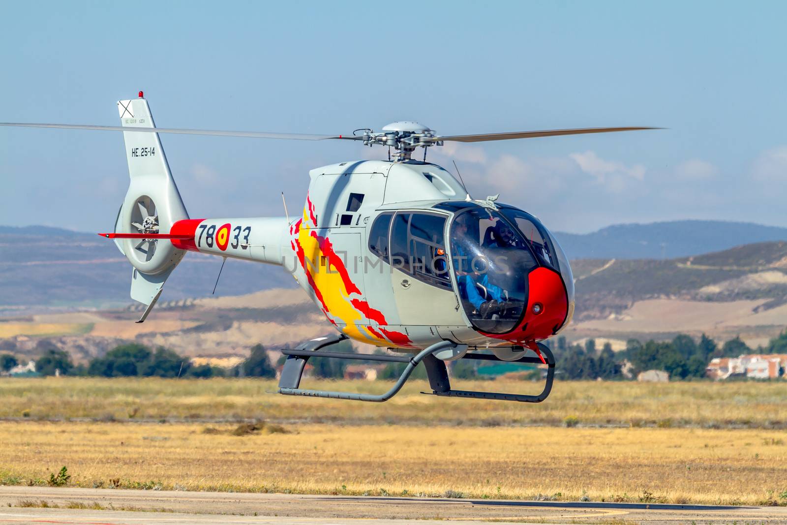 GRANADA, SPAIN-MAY 18: Helicopters of the Patrulla Aspa taking part in a exhibition on the X Aniversary of the Patrulla Aspa of the airbase of Armilla on May 18, 2014, in Granada, Spain