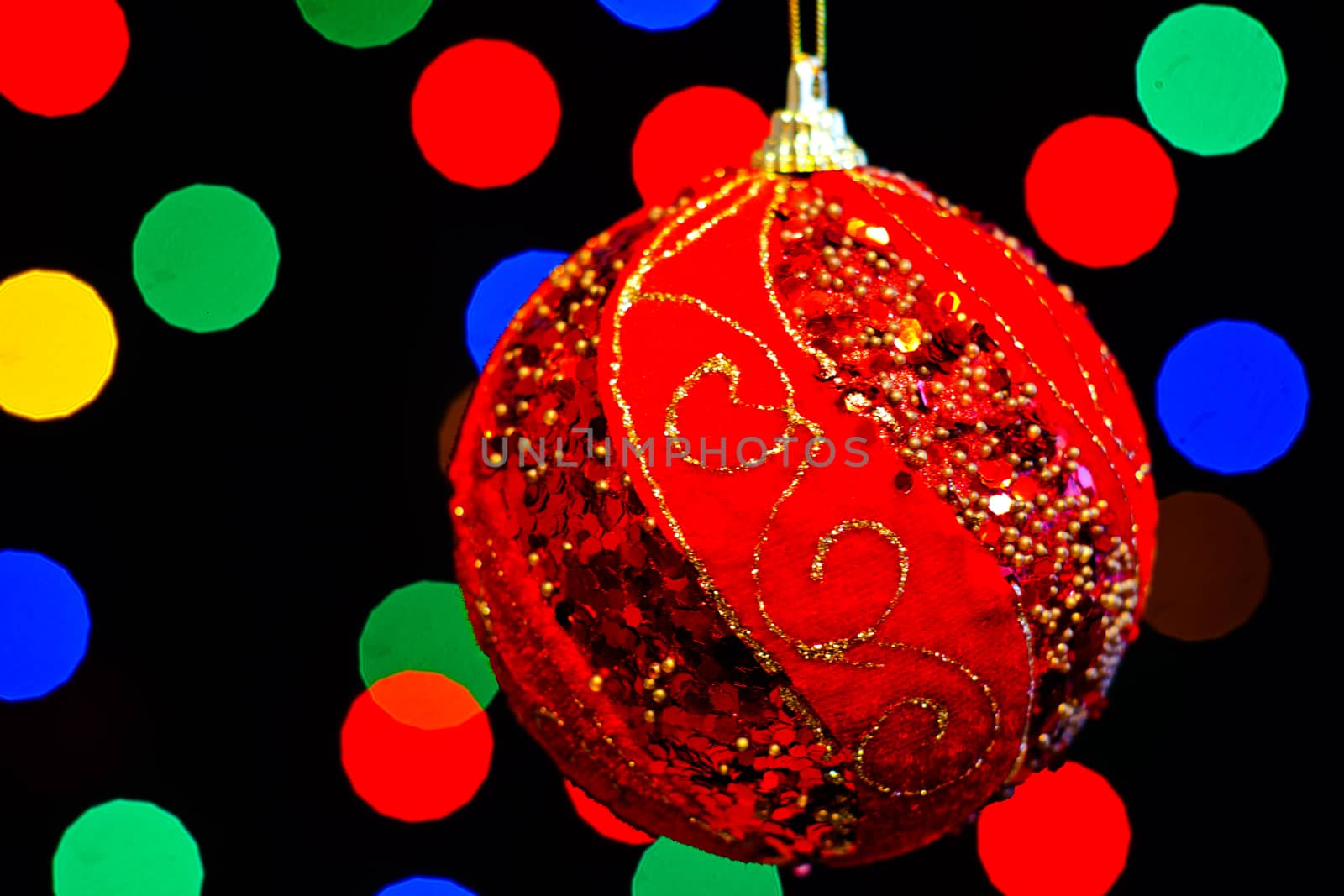 Red Christmas ball with lots of colors light