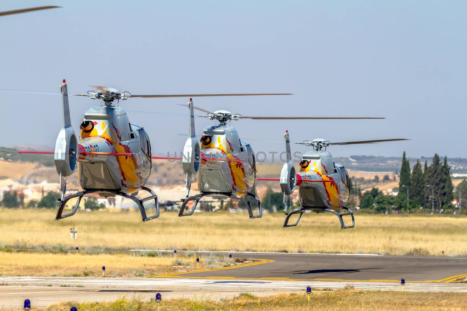 GRANADA, SPAIN-MAY 18: Helicopters of the Patrulla Aspa taking part in a exhibition on the X Aniversary of the Patrulla Aspa of the airbase of Armilla on May 18, 2014, in Granada, Spain